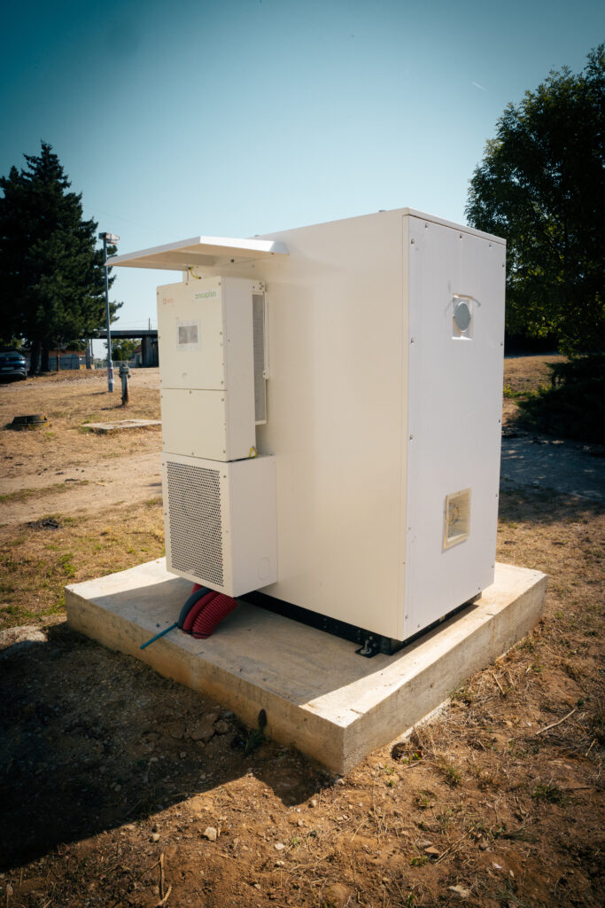 Battery storage cabinet with its top hatch open at the farm in Žarnov